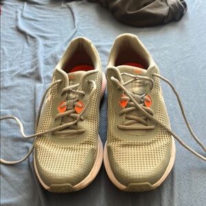 Stylish Blue Grey Sneakers with Orange Accents